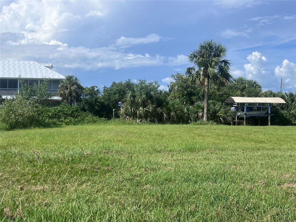 Photo of 24290 Blackbeard Boulevard, Punta Gorda, FL 33955 (MLS # A4622957)