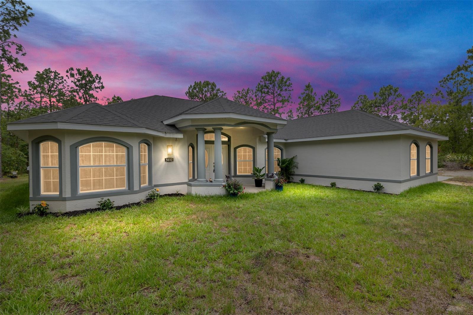 Discover this nearly new custom-built home, completed in 2025 and nestled on 4.1 acres of wooded land in a quiet cul-de-sac within an equestrian community. Enjoy the best of rural tranquility with suburban convenience in this stunning residence offering three (3) bedrooms and two (2) full baths in a desirable split floor plan.
Every window frames gorgeous wooded views, creating a serene and private retreat. The open-concept living space features beautiful luxury vinyl plank (LVP) flooring throughout, with elegant porcelain tile in the bathrooms. The kitchen showcases custom "leathered finish" granite countertops and top-of-the-line stainless steel appliances, including a convection oven, Samsung suite, Frigidaire Gallery refrigerator-freezer, and top-load washer and dryer. Appliances feature a high quality Induction Range for greater energy efficiency.
The spacious primary suite offers a luxurious bathroom and ample privacy. The third bedroom was originally designed as an in-law suite with its own separate entrance and a covered back porch, perfect for guests or extended family.
Enjoy added peace of mind with a six-camera outdoor security system with DVR and a home pre-wired with Cat 6 cabling and a 24-port switch for high-speed connectivity. The home also includes a front office with convenient floor outlets, and is pre-wired for a pool and hot tub with 240-volt service.
Water quality is exceptional, enhanced by an easy-to-maintain water treatment system and separate whole-house filtration system—though the natural water is fantastic on its own.
Additional features include:
Large master bedroom and ensuite bath
Tray ceilings throughout
Jetted walk-in tub with shower in the second bathroom
Oversized two-car garage
Quiet cul-de-sac location
Only six months old and move-in ready
Included for pet owners is a 8 ft by 16 ft Dog Kennel
This property combines thoughtful design, luxurious finishes, and modern infrastructure—making it the ideal place to call home. Schedule your private showing today!