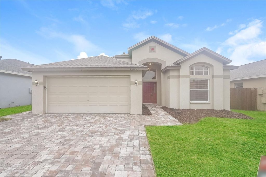 Photo of 29529 Crossland Drive, Wesley Chapel, FL 33543 (MLS # C7514785)