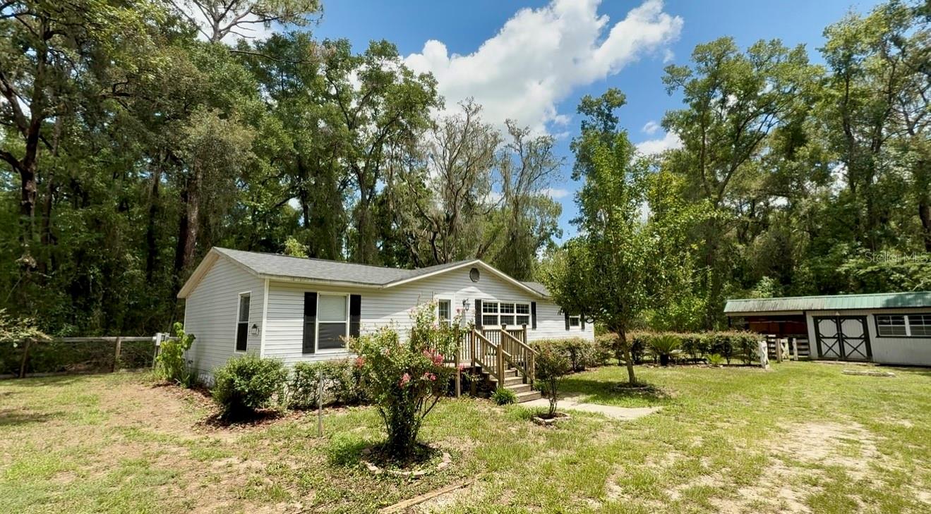 This updated 3 bedroom 2 bathroom home, features a brand new roof (2025) and new luxury vinyl plank flooring throughout, offering durability and style. The home is updated with fresh paint throughout, a 2019 water heater, and a 2017 HVAC system making this home truly move in ready! Refrigerator, Microwave and range oven included.
Step outside to a large fenced in yard with a covered back porch. A workshop/shed provides extra space for hobbies or storage. Nestled in a growing neighborhood. This property offers a blend of established charm and future value.
Don't miss your opportunity to own this turnkey home with all the essentials already updated!
