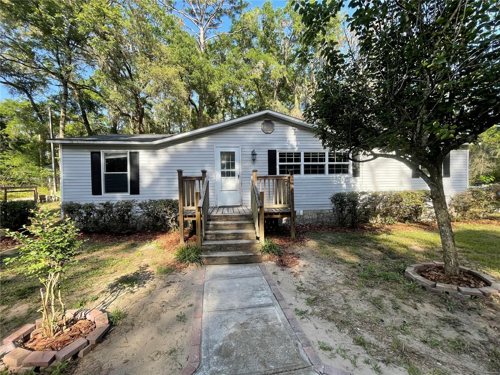 This updated 3 bedroom 2 bathroom home, features a brand new roof (2025) and new luxury vinyl plank flooring throughout, offering durability and style. The home is updated with fresh paint throughout, a 2019 water heater, and a 2017 HVAC system making this home truly move in ready! Refrigerator, Microwave and range oven included.
Step outside to a large fenced in yard with a covered back porch. A workshop/shed provides extra space for hobbies or storage. Nestled in a growing neighborhood. This property offers a blend of established charm and future value.
Don't miss your opportunity to own this turnkey home with all the essentials already updated!