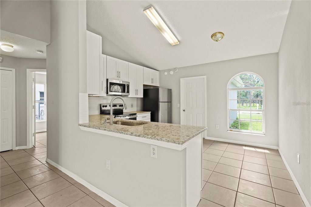 Photo of 145 Pompei Drive, Kissimmee, FL 34758 (MLS # TB8487078)