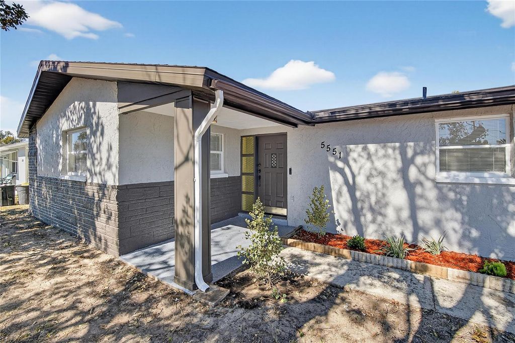 Photo of 5551 Mosaic Drive, Holiday, FL 34690 (MLS # TB8467750)