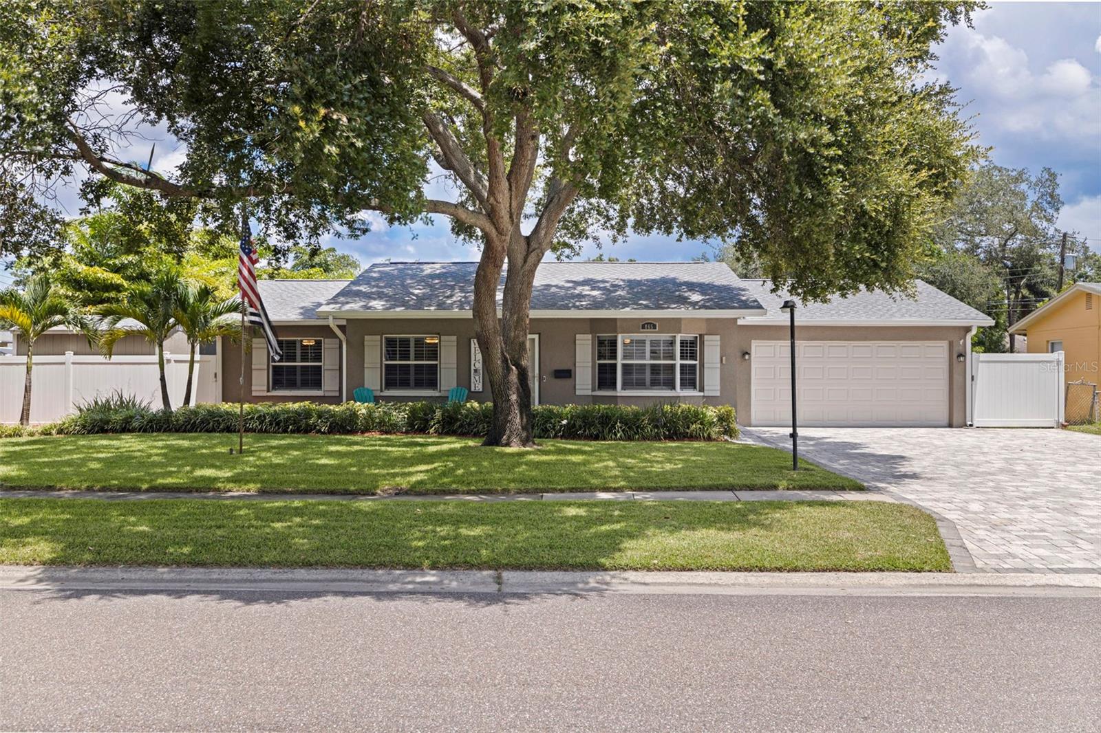 FLORIDA PLAYHOUSE - POOL HOME ON DOUBLE LOT WITH RV PARKING AND MULTIGENERATIONAL LAYOUT. First time ever on the market, this original family-owned residence offers 1,888 square feet of thoughtfully maintained living space on an oversized double lot in a high-and-dry location with no flood insurance required. Located near Allendale and Allendale Terrace, this home offers a spacious split-plan layout that is ideal for both privacy and family gatherings. Vacation in your backyard under the screened-in pool and lanai, a charming gazebo, with plenty of green space for play or relaxation. This home provides a private outdoor retreat ideal for weekend BBQs, gatherings, and sunny afternoons at home. Inside, the home is nicely updated, creating a warm and functional environment for everyday living. The current owners, passionate Disney enthusiasts and grandparents, have filled the home with joy, creativity, and character, giving it the feeling of a private retreat designed for memory-making weekends with grandchildren. Whether you're hosting family, welcoming guests, or simply enjoying the space for yourself, this property offers flexibility, comfort, and room to grow—all just a short drive from the beaches, downtown St. Petersburg, and local attractions. Plus, a 2-car garage, oversized parking pad, paved RV/boat pad with alley access, and dual “tuff sheds” offer storage and functionality. Recent improvements include IMPACT WINDOWS and a NEW ROOF (2024), providing peace of mind for years to come. The Rain Bird Irrigation system is on a deep well, saving money while helping you maintain a lush green yard. The permanent JellyFish Outdoor lighting is perfect for setting the mood and or being festive year-round. With its move-in-ready condition, entertainer’s ease, and versatile spaces, this is a home where memories happen. Don’t let this captivating home slip away—schedule your private tour today and discover the lifestyle that awaits!