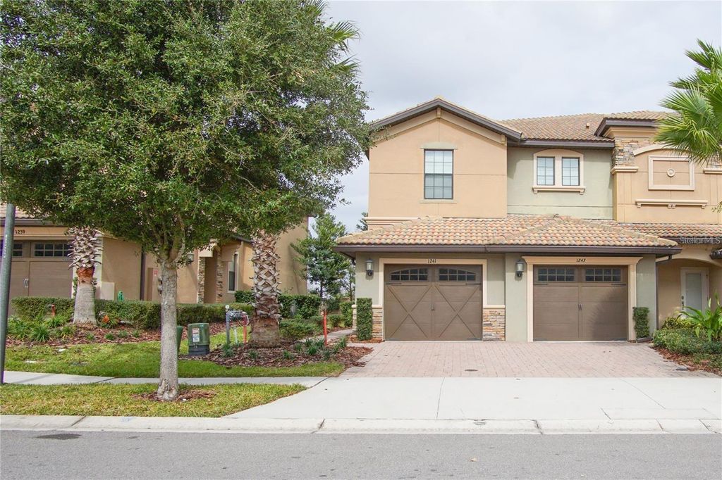 Photo of 1241 Long Cove Loop, Davenport, FL 33896 (MLS # O6396675)