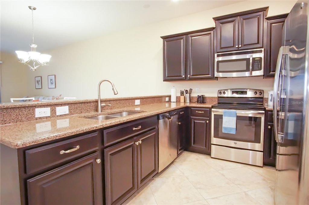Photo of 1241 Long Cove Loop, Davenport, FL 33896 (MLS # O6396675)