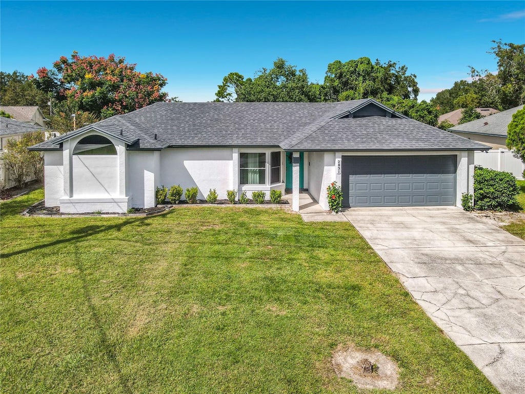 Photo of 2831 Idleweise Drive, Deltona, FL 32738 (MLS # O6430548)