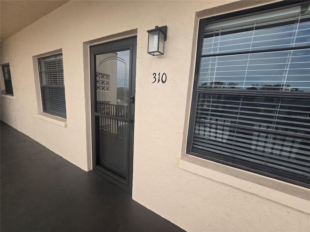 Photo of 5971 Terrace Park Drive N #310, St Petersburg, FL 33709 (MLS # TB8475270)