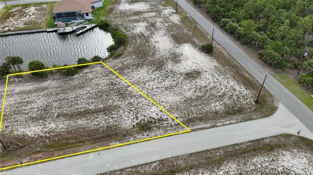 Photo of 4016 NW 42nd Place NW, Cape Coral, FL 33993 (MLS # A4652691)