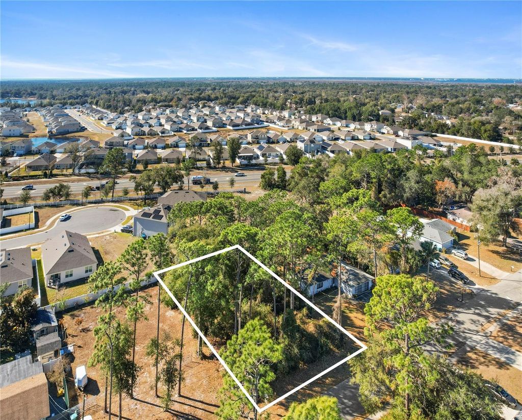 Photo of 102 Neal Drive, Deltona, FL 32738 (MLS # O6380951)