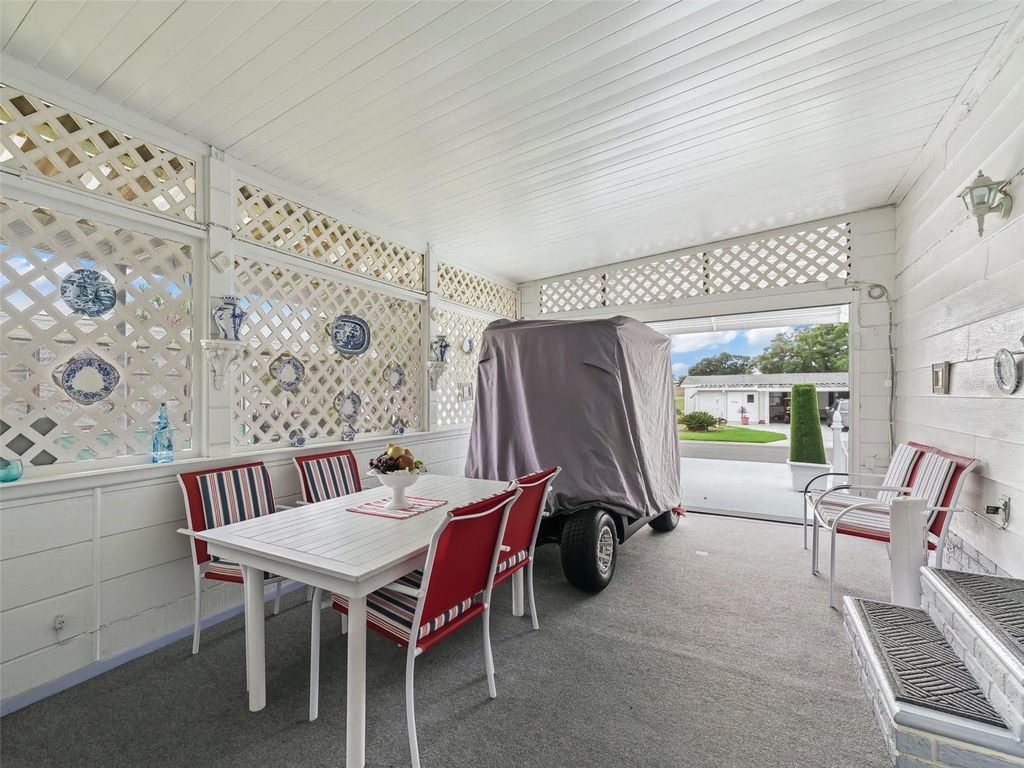 Photo of 1705 W Schwartz Boulevard, Lady Lake, FL 32159 (MLS # OM705626)