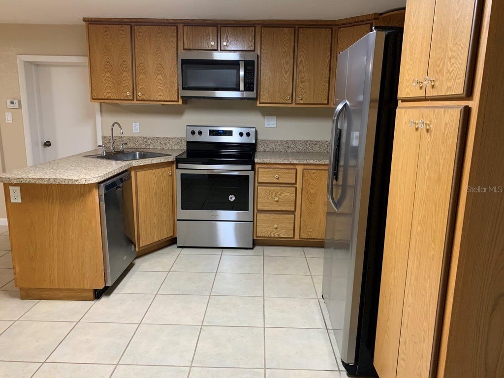 Photo of 108 E Hazel Street, Orlando, FL 32804 (MLS # O6432231)