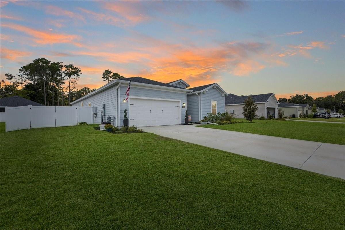 Custom 4-Bedroom Home with Soaking Spa & Outdoor Lounge in Country Lane Estates
Welcome to this thoughtfully upgraded 4-bedroom, 3-bath home in the quiet Country Lane Estates community of Williston. Featuring over 2,000 sq ft of single-level living, this property blends clean, modern finishes with standout custom touches inside and out.
The open-concept layout centers around a bright kitchen with stainless steel appliances, white shaker cabinets, a large island with bar seating, and a walk-in pantry. Durable wood-look tile flows through the main living areas, where a shiplap fireplace wall adds warmth and style. The spacious primary suite includes a private en-suite bath and walk-in closets, while the flexible 4th bedroom easily doubles as an office.
Step outside and unwind in your own backyard retreat — complete with a custom wood deck, built-in circular plunge-style soaking spa, and privacy fence with designer lighting. Whether you’re hosting friends or enjoying a peaceful evening under the stars, this space brings year-round relaxation home.
Country Lane Estates offers low HOA living with easy access to schools, local shops, and Highway 27 for quick drives to Bronson, Ocala, or Gainesville. This is comfort, convenience, and creativity — all in one move-in ready home.