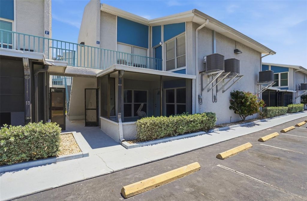 Photo of 155 Medallion Boulevard #E, Madeira Beach, FL 33708 (MLS # TB8506686)