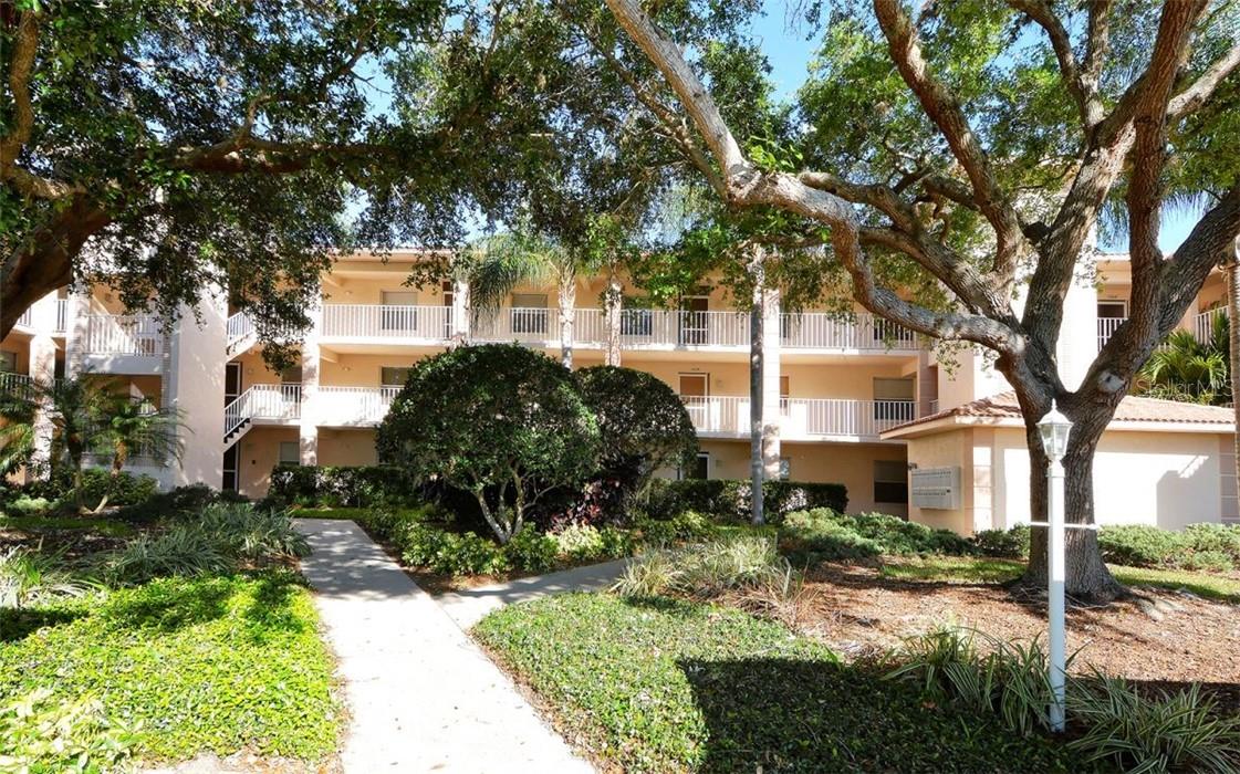 RENTED JAN, FEB. MARCH APRIL 2025: This third-floor vacation condo with absolutely one of the best views in Stoneybrook. Two bedrooms, two baths, king bed in master, queen in the guest bedroom, internet access, flat-screen TVs and a NEW KITCHEN complete with granite countertops. Eating space in kitchen, living room dining room combo, one covered parking space. ALL NEW FLOORING throughout, everything you need for a few months in the sunshine. Golf membership transfers for a fee if desired (check with clubhouse for cost) and the heated pool and tennis courts are right across from the building. Members can dine at the impressive clubhouse, use the fitness center, enjoy the Arthur Hills designed premier golf course, lounge at the pool, play tennis, and enjoy the many activities the club has to offer. Stoneybrook is a gated community conveniently located on Palmer Ranch giving quick access to shopping, banks, restaurants, I-75, and less than 15 minutes to the sugary sandy beaches of Siesta Key. The Legacy Walking and Biking Trail access is just a block from the entrance to the community and it's a short drive to downtown Sarasota.