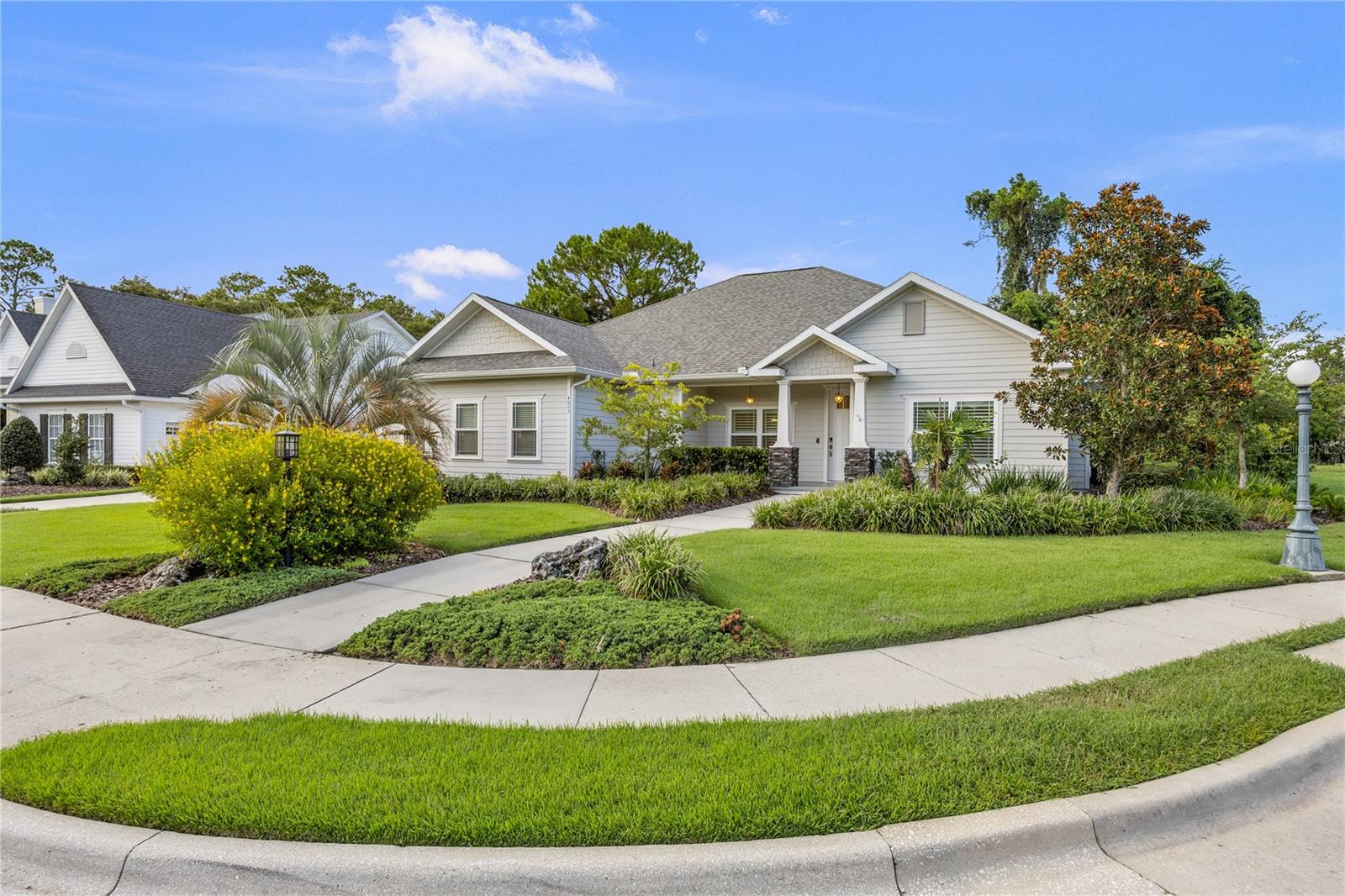 One or more photo(s) has been virtually staged. Tucked away in the gated community of Savanna Pointe, this meticulously maintained 4-bedroom, 3-bathroom home offers an exceptional blend of comfort, privacy, and connection to nature—all just minutes from the heart of Gainesville. Built in 2017 and feeling just like new, the home sits on a beautifully landscaped lot that backs directly to lush undeveloped land, providing a rare sense of space and serenity with no neighbors behind.
Inside, the home spans over 2,140 heated and cooled square feet, with a total of 2,905 square feet under roof. The layout is as functional as it is elegant, featuring a split floorplan that offers privacy for all. The spacious primary suite includes dual walk-in closets and a beautifully finished bathroom with dual vanities and an oversized walk-in shower. One of the secondary bedrooms includes an en-suite bath and also functions beautifully as a den, office, or guest retreat with its own private bathroom access—ideal for flexible living arrangements.
The kitchen opens to a generous main living area and features granite countertops, custom cabinetry, stainless steel appliances, and a large island for gathering and meal prep. A separate dining space sits just off the kitchen, and tall ceilings and abundant natural light enhance the home’s open, airy feel throughout. The living room seamlessly extends to a large covered patio, perfect for morning coffee or unwinding at sunset while taking in the peaceful backdrop of trees and open sky. Just beyond, a pavered open-air patio with built-in firepit invites casual outdoor entertaining under the stars—whether you're hosting friends or enjoying a quiet evening by the fire.
Throughout the home, thoughtful details abound—from upgraded light fixtures and fans, to wide-plank wood floors, plantation shutters, and stylish tile in all the right places. The oversized laundry room and 2-car garage offer ample storage, and a Generac whole-home generator adds peace of mind during storm season. The overall design of the home prioritizes ease of living without sacrificing comfort or quality.
Savanna Pointe is one of Gainesville’s most desirable communities, known for its quiet streets, mature landscaping, and timeless architectural style. Weekly front and back yard landscape maintenance is included, and the secure 24/7 gated entry adds peace of mind. But what truly sets this neighborhood apart is its location—perched along the edge of Paynes Prairie Preserve State Park, one of Florida’s most iconic natural areas. With sweeping views, wildlife sightings, and a sense of open prairie sky, living here feels like being gently wrapped in nature without leaving city convenience behind.
Just minutes away are UF Health at Shands, the VA Hospital, the University of Florida, and the vibrant dining and culture of downtown Gainesville. For nature lovers, Paynes Prairie offers unmatched access to hiking, birding, photography, and quiet reflection just outside your door.
Whether you're downsizing from a larger family home or seeking a refined, low-maintenance lifestyle surrounded by natural beauty, this home offers the rare combination of quality construction, privacy, and location in one of Gainesville's most visually and emotionally compelling settings.
