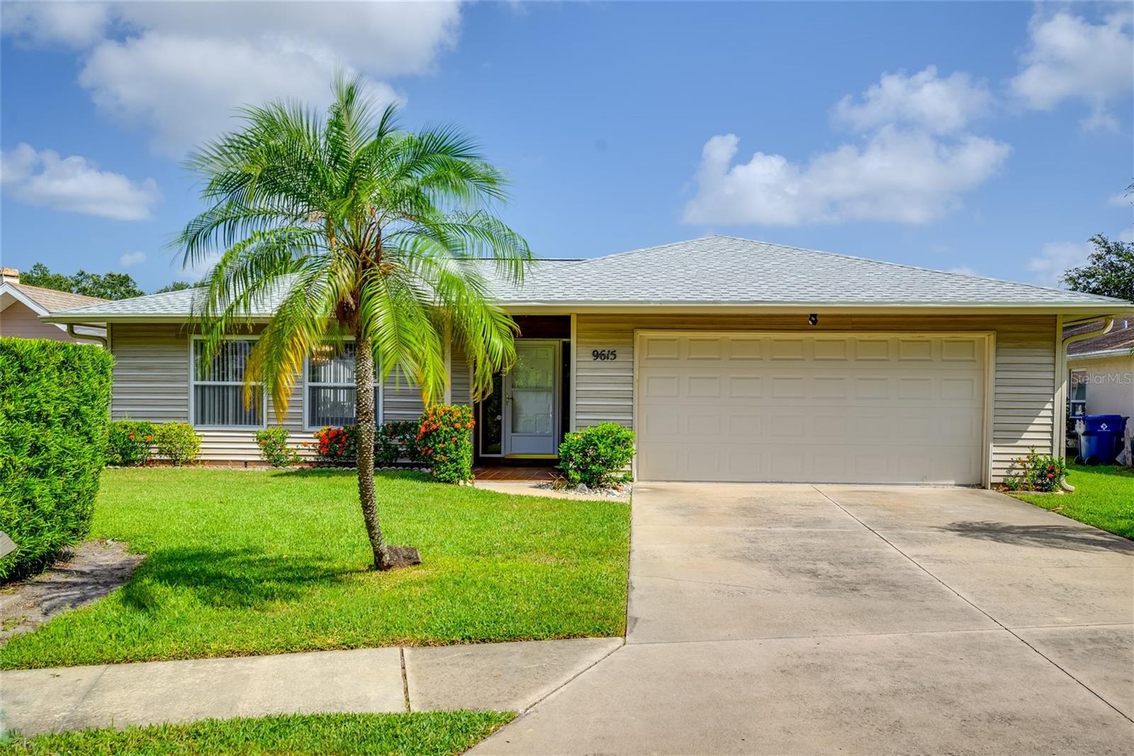 Rare opportunity to live on a tranquil lake in quiet Bay Pines Estates. This spacious 1,864 sq ft home offers a fantastic floorplan that includes an oversized Living Room/Dining Room combination, a large Kitchen that opens to an additional Eating Area and Family Room with a wood burning fireplace, two roomy secondary bedrooms, and an updated shared bathroom. The Primary Suite includes an updated private bathroom, a walk-in closet, and a Bonus Room that boasts unobstructed views of the water. Step outside the Bonus Room or the Family Room sliding glass doors to a newer screen enclosed patio with Kool Deck coating and an inground Pool. Relax poolside while you enjoy your waterfront view. Nature and Outdoor enthusiasts will appreciate the peaceful backyard with wildlife, fish, and a variety of birds. Conveniently located close to shopping, dining, and the area's Award-Winning Beaches. Just a short drive to Bay Pines Marina (1.9 miles), the 112 acre waterfront Veterans Memorial Park and public Boat Ramp (2 miles), Madeira Beach (3 miles), and just blocks away from the scenic Pinellas Trail. Located in Unincorporated Pinellas County.