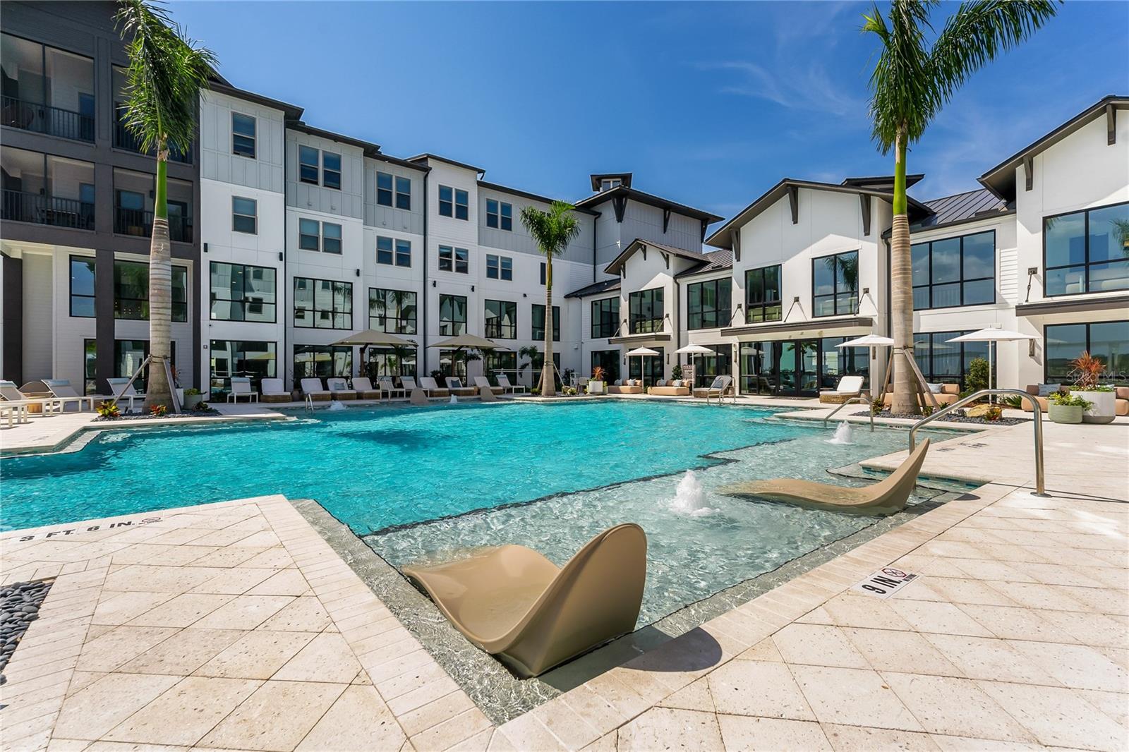 The Row Waterside in Lakewood Ranch is a rental community located in Sarasota County. These spacious studio, one, two and three bedroom apartments and two and three bedroom townhouses, are full of the modern conveniences and amenities that you would want in your rental. Every unit in this community offers beautifully done finishes with open concept layouts, contemporary lighting fixtures, custom cabinetry, gourmet kitchens with executive chef undermount sinks, energy efficient and stainless appliances and full-sized washer and dryers. The townhouses have their own attached 2-car garages. These are just a few of the many features you will have in your apartment or townhouse. The Row Waterside also allows up to two pets per apartment. You will have full access to all the amenities this community has to offer, a resort-inspired swimming pool, full-size grilling options with lounging areas by the pool, poolside gaming area with cornhole, state-of-the-art fitness center, movie theater, cyber café, pet spa, gourmet coffee bar, private conference rooms, the amenities list is endless at The Row. Located within walking distance of Main Street in Waterside, you will find endless shopping, restaurants, and entertainment. (Minimum 7-month leases are available (Pricing varies on shorter terms). Up to 6 WEEKS FREE on select units AND $99 "Look and Lease" with reduced admin and application fee at move in!!!