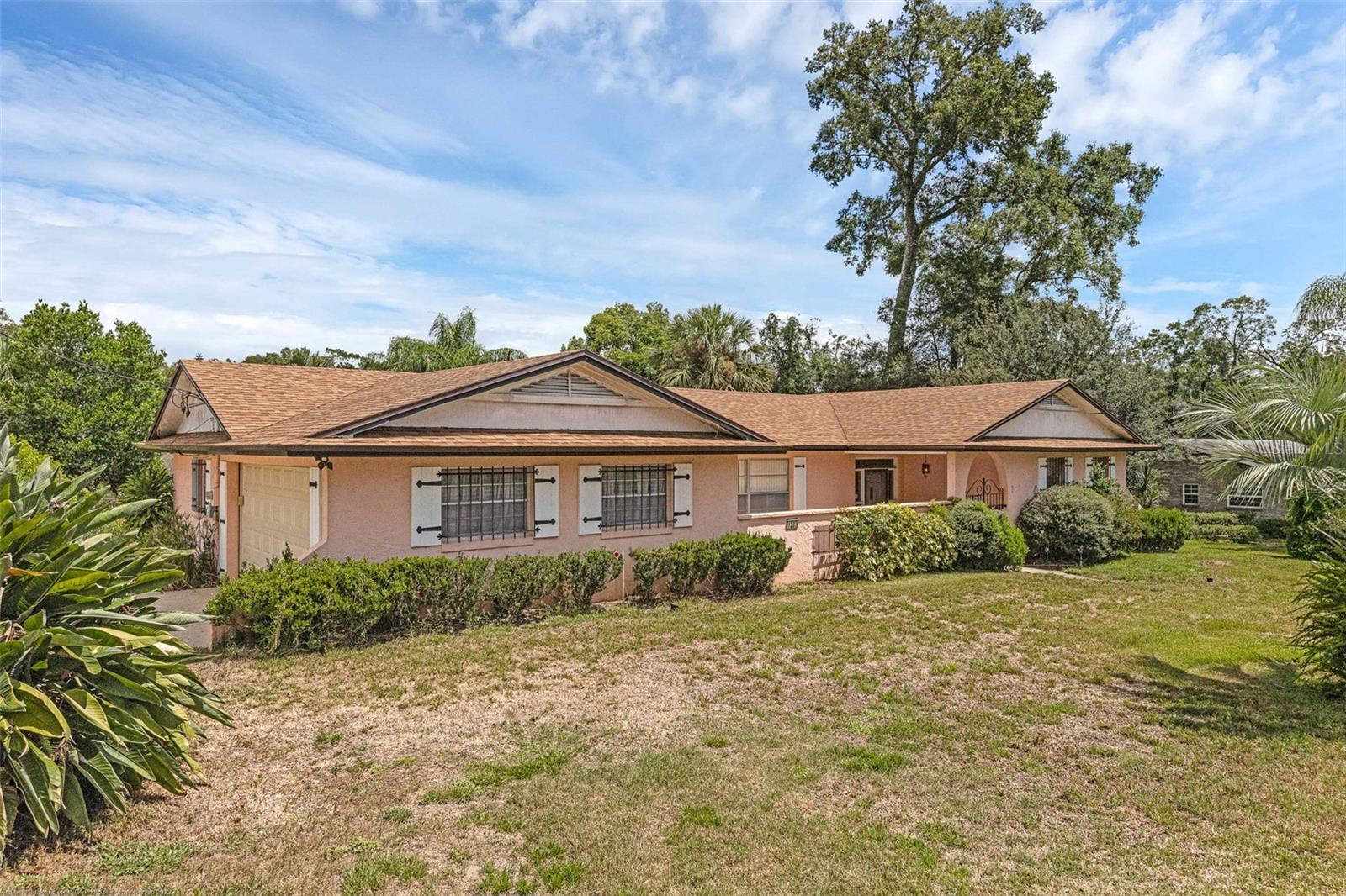 Welcome to this spacious home centrally located between New Smyrna Beach and Downtown Orlando in Deland! With no HOA restrictions, this home offers a blank canvas for you to put your personal touches on and create the living space of your dreams! The residence has a newer roof installed in July of 2021 and a new garage door was installed in 2019. With 1,933 square feet there is no lack of space so bring the family! The home has 3 bedroom with two bathrooms and features a large kitchen, inside laundry, a 12 X 20 family room and an outdoor inground pool for all your entertaining. This large corner lot has a side gate for all your toys, so bring the RV and/or Boat. For the fisherman, there is plenty of places to fish as it is a 30 minute drive from New Smyrna/Daytona Beach and a 45 minute drive from the Port Canaveral Natural Seashore! The property is close to dining and shopping in Downtown Deland and within an hours drive of Downtown Orlando with access to I-4.