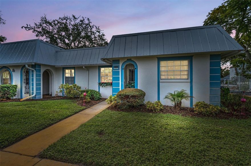 LOCATED IN THE GARDENS OF BEACON SQUARE! This UPDATED 1032 SQ FT 2 Bedroom 2 Bath and 1 car carport is nestled in the vibrant 55+ Gated Community directly across from the club house!! Kitchen has gleaming stainless-steel appliances providing a chic, functional space for all your culinary creations. Beautiful Laminate flooring flowing through most of home. With its modern touches, generous living spaces, and ideal layout, this home is perfectly suited for a vibrant, low-maintenance lifestyle in a welcoming community Step inside and discover an inviting great room, enhanced by newer laminate flooring that adds warmth and style throughout the main living areas. The updated kitchen shines with contemporary finishes, making meal preparation a delight while providing a wonderful space to gather with friends or family. The open-concept design offers a natural flow between the living, dining, and kitchen areas, creating a sense of spaciousness within the 1,032 square feet interior. Retreat to the impressive LARGE primary bedroom, where comfort meets function. Here, you’ll find laminate flooring, a large walk-in closet for all your storage needs, and a private en suite bathroom that offers a peaceful sanctuary at the end of the day. The guest bedroom also features laminate flooring and is located conveniently near the updated guest bathroom—perfect for overnight visitors or a flexible space for hobbies or a home office. Beautiful Florida room with storage closet. and outside brick patio for relaxing, Though the lot size is designed for minimal exterior upkeep, you’ll enjoy the carefree lifestyle this condo affords. Gardens of Beacon Square is a maintenance free gated community which features a heated pool & recreation center with many social activities, clubhouse, library and shuffleboard courts, laundry facility, Cable, internet, water, sewer and trash are all include in the condo fee as well! This is more than just a home; it's a lifestyle tailored to ease and enjoyment. Roof 2023...Come see this Amazing END UNIT CONDO TODAY!!