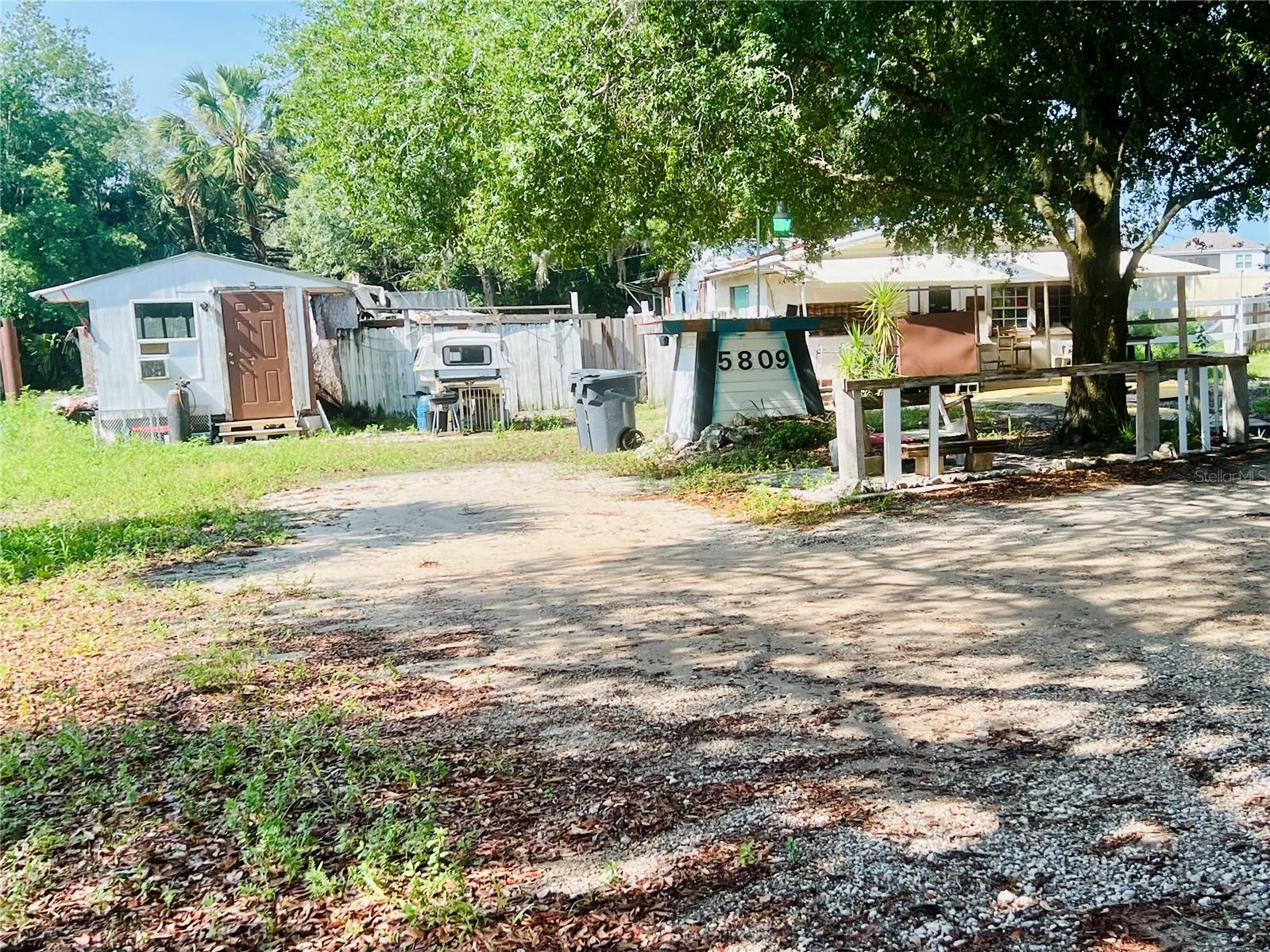 Almost 1/2 an Acre, Ready to Renovate or Remove Home. Property is surounded by homes substantiaily higher in value on smaller lots. This Property will make a WONDERFUL FUTURE INVESTMENT due to location and adjacent properties.