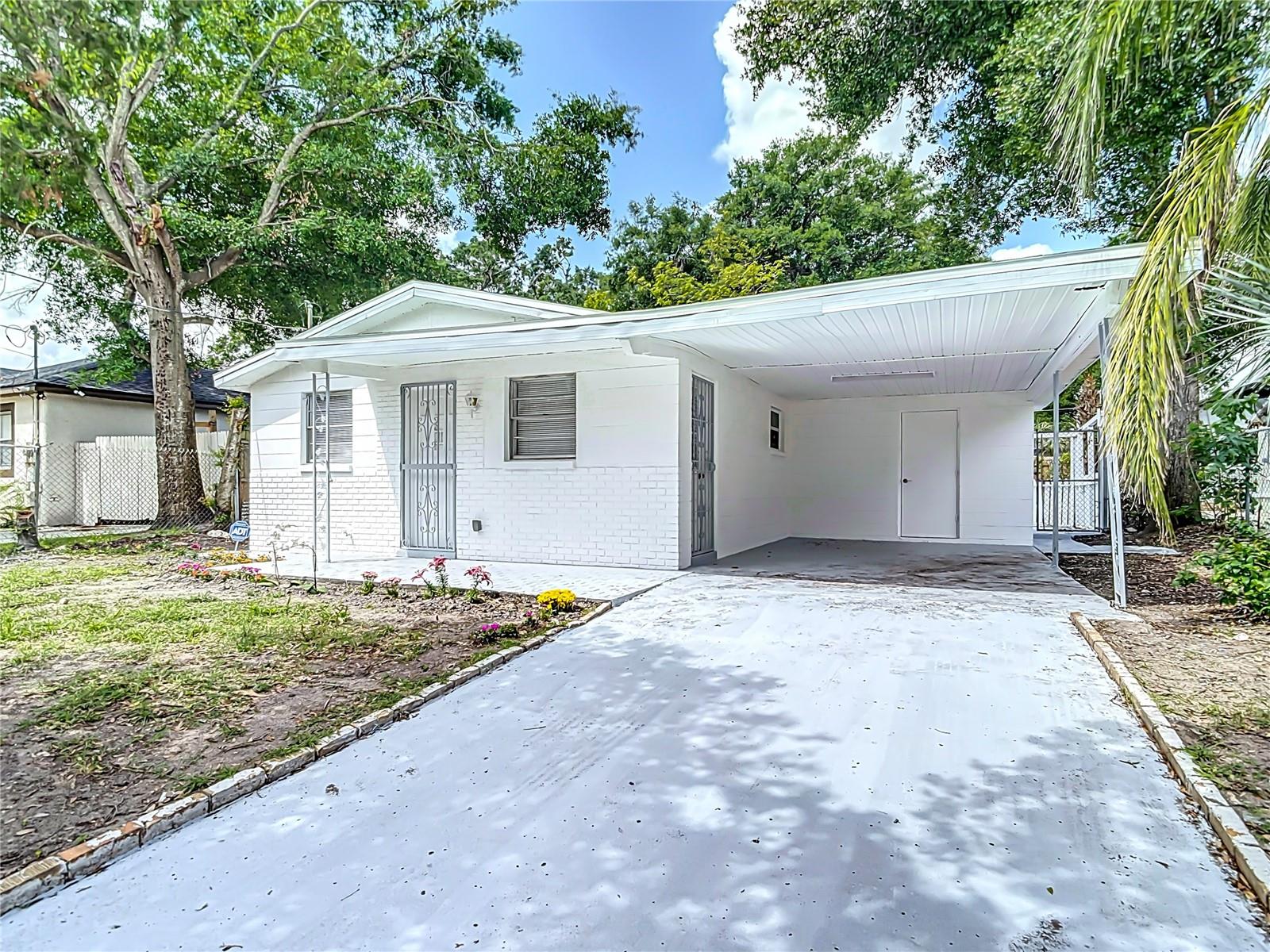Beautiful, move in ready 2 Bedroom 1 Bath Single Family Home on large Lot with carport , separate utility room and fenced yard. Property features new stainless steel appliances, Newer AC unit, Brand New Roof. No HOA near major highways, restaurants and lively entertainment