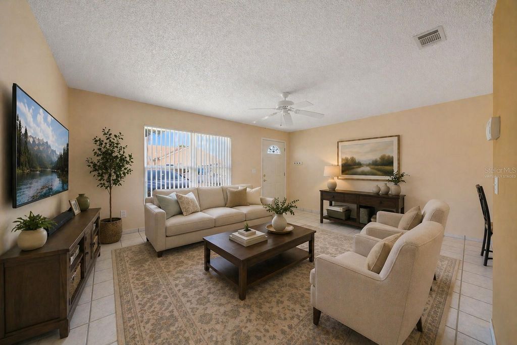 Photo of 67 E Country Cove Way, Kissimmee, FL 34743 (MLS # O6401366)