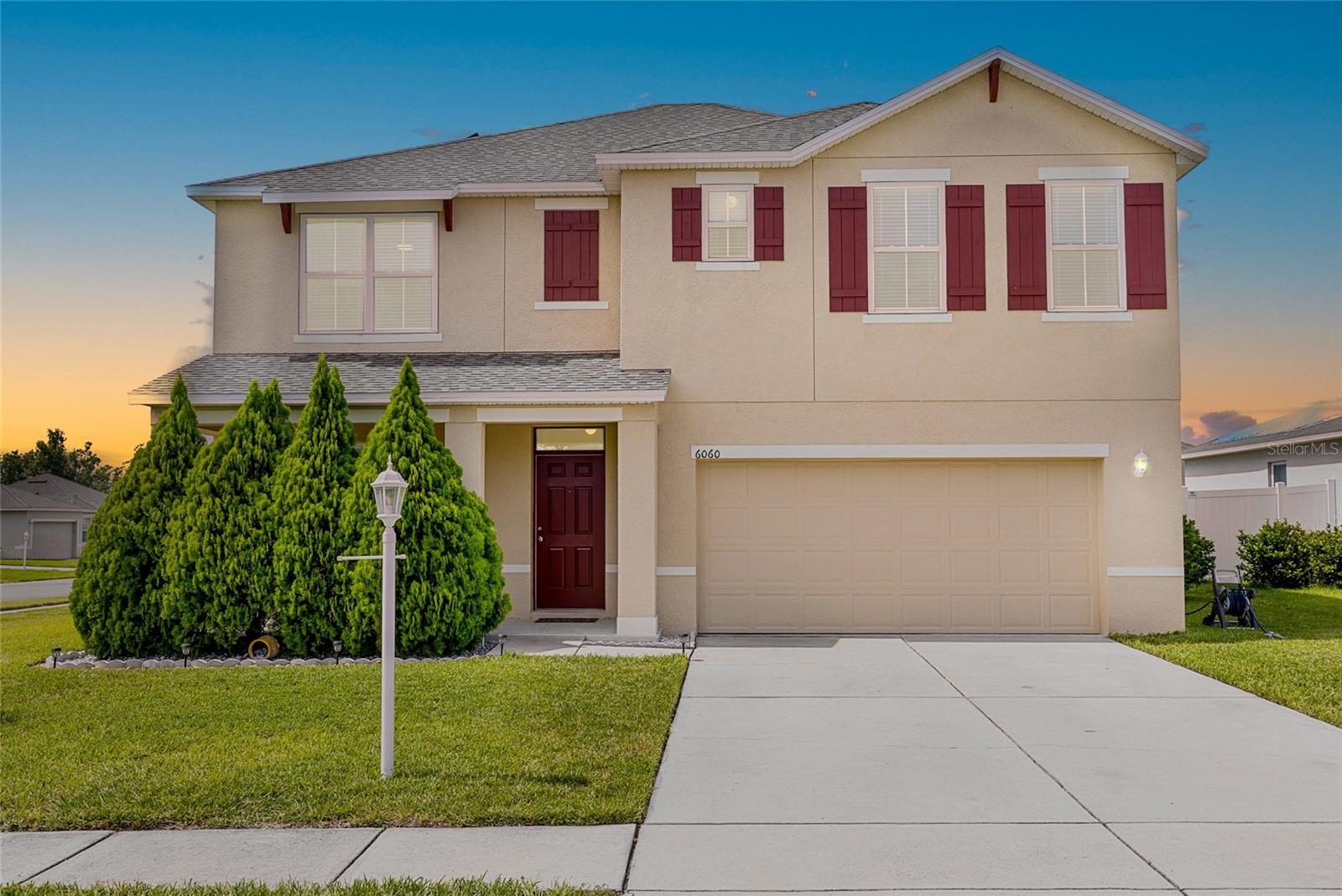 Under contract-accepting backup offers. Welcome to 6060 Forest Ridge Lane, a move-in ready and partially furnished 5-bedroom, 3-bathroom home located on an oversized corner lot in the established Forest Ridge community of Winter Haven with no CDD. From the moment you arrive, the covered front porch and mature landscaping create a peaceful first impression.
Step through the front door into a spacious and thoughtfully designed layout. The main level includes a full bedroom and bathroom—ideal for guests, multi-generational living, or a private office setup. A separate flex room near the entrance provides additional space for a home office, playroom, or hobby room.
The open-concept kitchen is the centerpiece of the main living area, featuring a center island, 36” upper cabinets, and ample space for gathering. All kitchen appliances have been recently upgraded to smart technology, and the adjacent dining area flows seamlessly into the living room, allowing for easy entertaining.
Throughout the home, 18x18 tile flooring provides a clean, modern look and low-maintenance living. Natural light enhances the open feel of the floor plan, creating a bright and welcoming environment.
Upstairs, you’ll find the remaining bedrooms, including a generous primary suite and a conveniently located laundry area with smart washer and dryer. Each space is designed for comfort and functionality.
Recent improvements include a new roof installed within the last four months, a tankless water heater, fresh interior paint, and exterior paint completed within the past two years—offering added value and peace of mind.
Outside, the oversized corner lot offers room to enjoy the outdoors in a tranquil neighborhood setting. The Forest Ridge community is known for its quiet streets and natural surroundings, while being just minutes from Highway 27 and approximately 15 minutes from I-4, providing easy access to Central Florida’s major destinations, schools, and shopping.
This well-maintained home offers a flexible layout, smart upgrades, and a prime location. Contact your agent today to schedule a private showing.