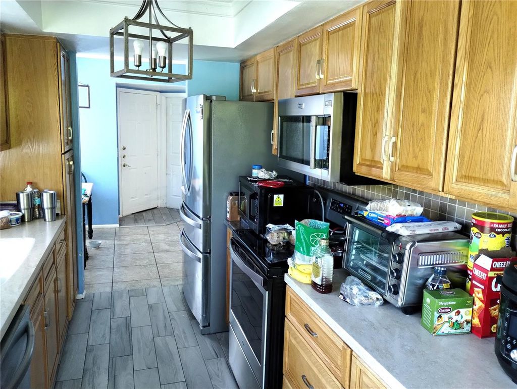 Photo of 11543 Orleans Lane #B, Port Richey, FL 34668 (MLS # W7883952)