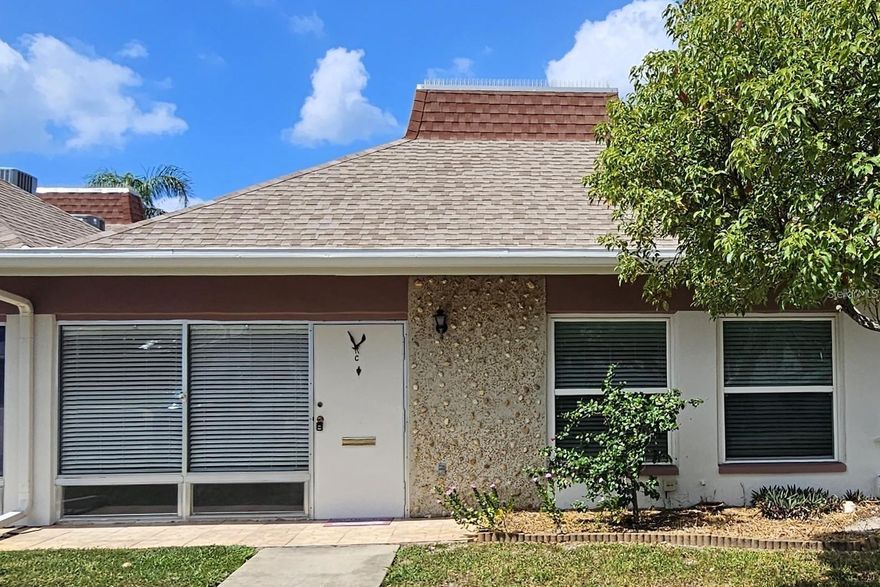 UNFURNISHED - 2-bedroom, bath and a half condo in Tahitian Gardens a GATED 55+ community. This unit has been updated throughout. Features all tile floors, granite counters in kitchen and baths. Washer/dryer hookups or use the community's private laundry facility. Convenient parking is located directly in front of the unit. Enjoy the heated pool, clubhouse and many activities or just take a relaxing walk on the paved sidewalks throughout the community. Tahitian Gardens is located off US 19 in Holiday, FL with quick access to the Gulf of Mexico Beaches, Tampa, Clearwater and St. Pete. Contact us today to schedule your showing. Will not last long!