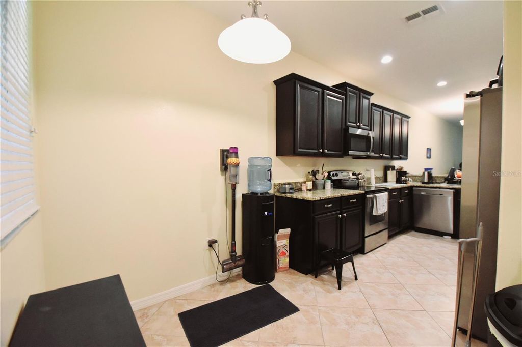 Photo of 9540 Trumpet Vine Loop, Trinity, FL 34655 (MLS # TB8432878)