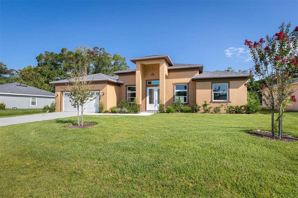 Photo of 57 Flamingo Drive, Palm Coast, FL 32137 (MLS # FC320658)