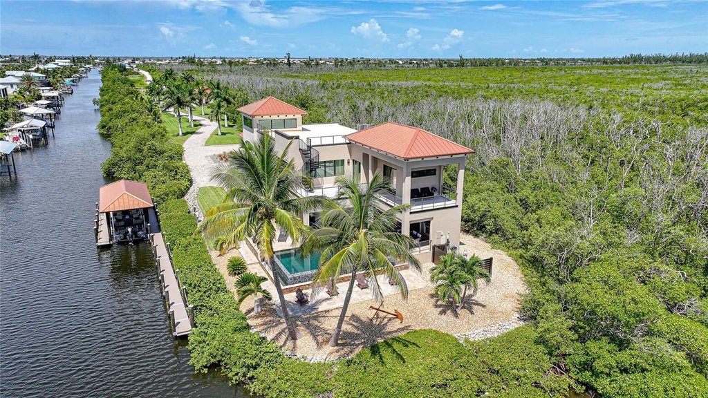 Photo of 2755 Cussell Drive, St James City, FL 33956 (MLS # C7530353)