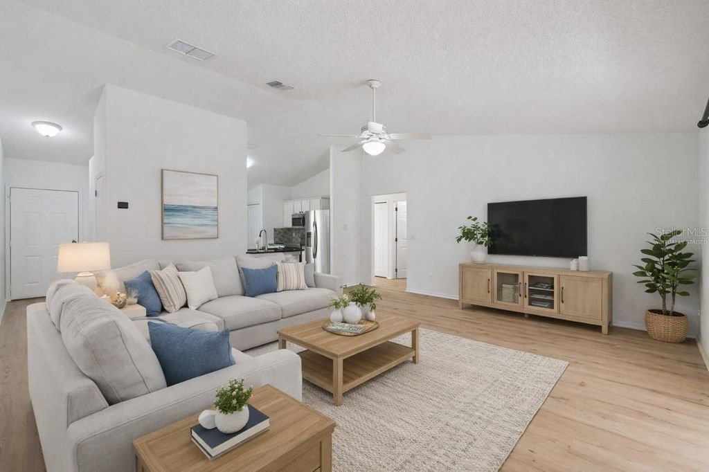 Photo of 13808 Riverpath Grove Drive, Orlando, FL 32826 (MLS # O6388878)