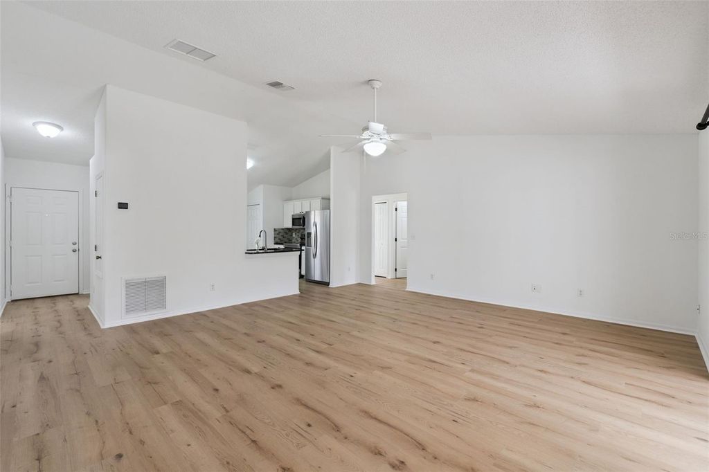 Photo of 13808 Riverpath Grove Drive, Orlando, FL 32826 (MLS # O6388878)