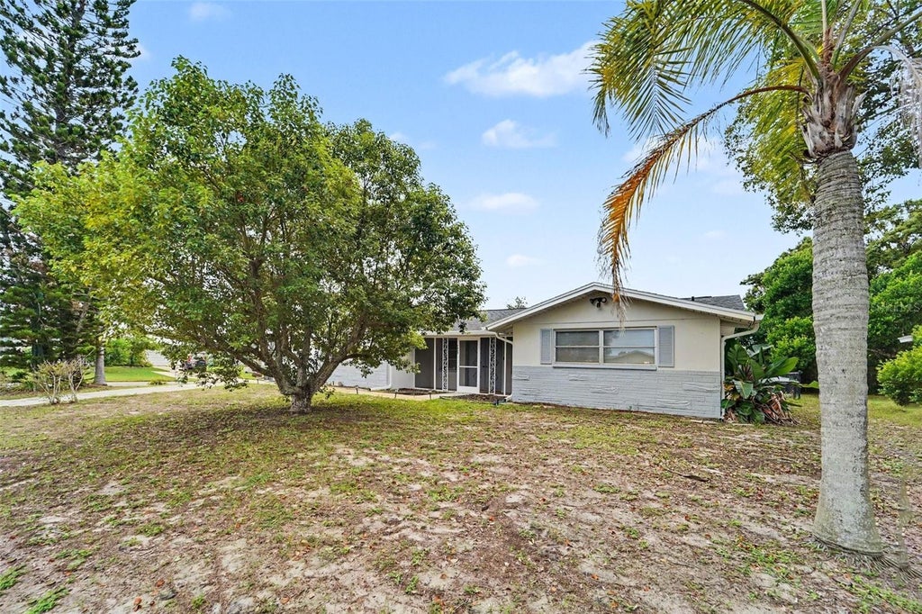 Photo of 7922 Lilac Drive, Port Richey, FL 34668 (MLS # TB8554994)