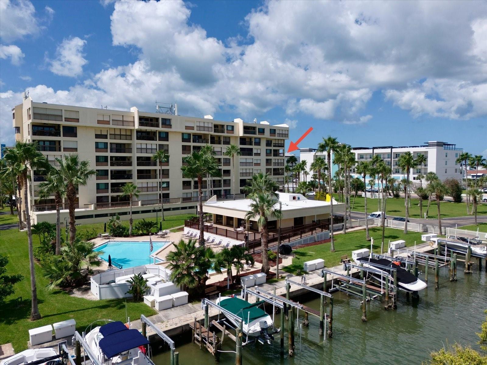 Welcome to paradise in Boca Vista Condominiums! Enjoy stunning Intracoastal and Gulf views from this spacious 2-bedroom, 2-bath condo. The residence features a large terrace with access from both the living room and primary bedroom, plus an additional west-facing balcony perfect for taking in sunset skies. Flooded with natural light, the home is fitted with hurricane-rated windows and doors for peace of mind.
Bright, functional kitchen with small eat in area, closet pantry and washer/dryer closet. Spacious living room area and dining area offers plenty of room for entertaining and living space. The expansive primary suite offers a generous layout with double sinks, a separate shower area, and ample closet space. While the condo is ready for updates and personal touches, it provides a wonderful opportunity to create a customized retreat. With its desirable views, bright interiors, and functional floor plan, this property is an excellent canvas for your vision. Boca Vista Condominiums are located just a short walk to Madeira Beach local town center and waterfront, and an area of new development. The complex features a heated pool and jacuzzi spa adjacent to the clubhouse, offering tennis courts and fitness equipment. New AC unit, and complex has a newer roof. The unit includes 2 assigned parking spaces, one is covered under a carport. HOA enforces a no pet policy, and 30 day minimum rental. Come live the Florida Lifestyle!