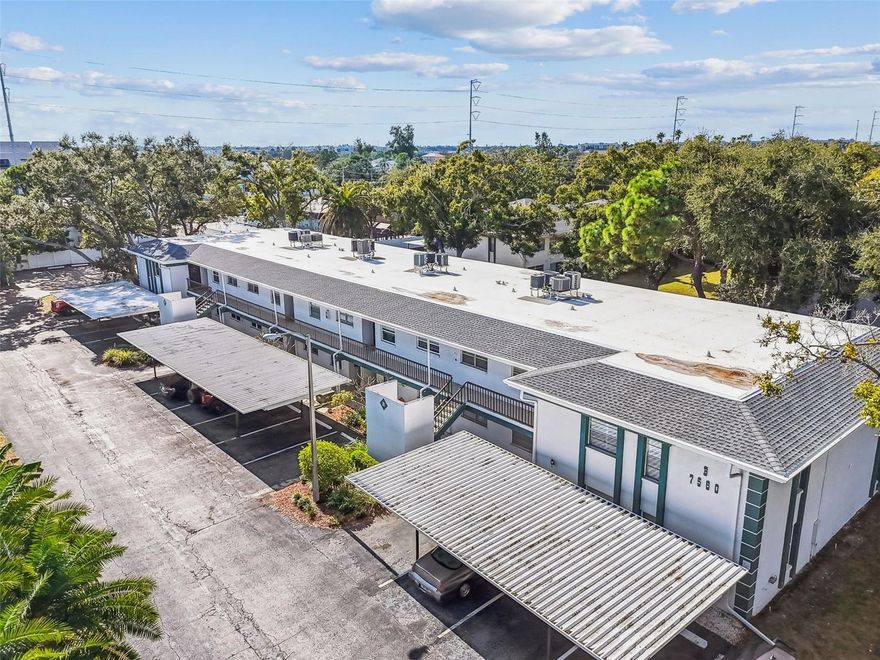 Welcome to this beautifully updated 1 bedroom, 1.5 bath, ground floor corner condo in Largo, just minutes from Seminole!!! Offering exceptional value for first time buyers, snowbirds, or investors!!! This move in ready unit features new flooring, fresh paint, updated fixtures, a bright open layout, and a refreshed kitchen with newer KitchenAid appliances and ample dining space. A rare flex room with matching flooring provides the perfect office or extra storage. The spacious primary bedroom comfortably fits a king bed and includes generous closets and full in-unit laundry, while the renovated ensuite bath offers granite countertops, modern cabinetry, updated lighting, and a beautifully tiled walk in shower. Guests will appreciate the convenient half bath. The outdoor area with no rear neighbors adds peaceful appeal. With covered parking just steps from the door and low monthly fees in a well maintained community close to beaches, shopping, parks, and dining, this condo delivers affordable, low maintenance living in the heart of Pinellas County. Schedule your showing today! (A/C 2022)(W/H 2022)