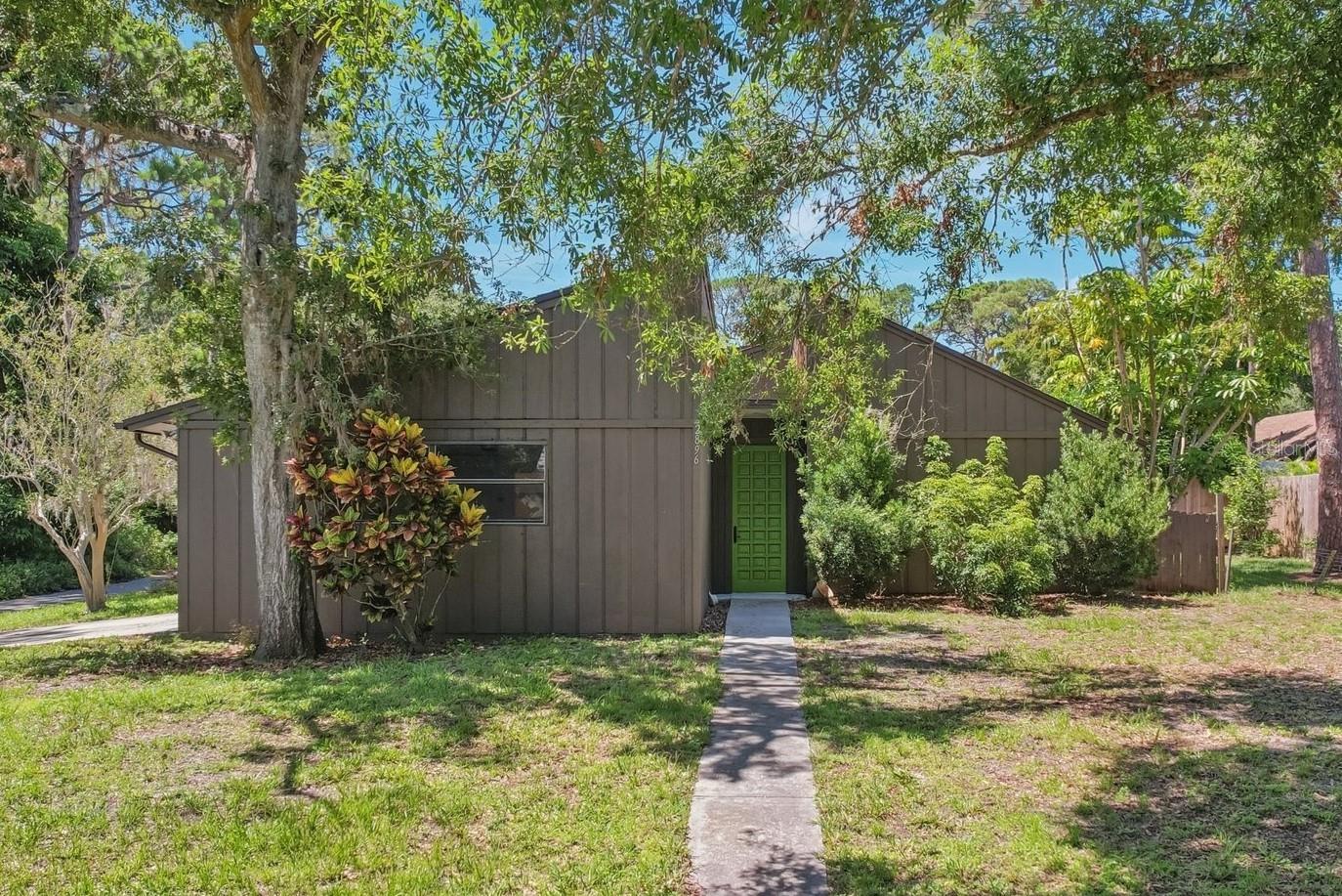 One or more photo(s) has been virtually staged. Discover your very private, not in a flood zone, Sarasota oasis—tucked away at the end of a quiet street, surrounded by mature pine trees and lush greenery. This hidden gem offers a peaceful lifestyle on an expansive over 1/4 acre lot that backs to a greenbelt, ensuring privacy. Step through a gated courtyard garden and into a welcoming great room with soaring vaulted ceilings and a stunning brand-new gourmet kitchen (2024)—perfect for everyday living and entertaining.
The oversized covered patio and fully fenced backyard are ideal for enjoying Florida’s year-round outdoor lifestyle. Room for a pool! Whether you’re hosting friends or relaxing solo, you’ll love the space, shade, and quiet. There's even room to park your boat or RV, with a generously sized two-car garage providing plenty of storage.
Major updates include a new roof (2019) and new AC system (2024), giving you peace of mind and comfort for years to come. With wonderful neighbors and a central Sarasota location, and zoned for great schools, this unique retreat offers the perfect privacy and convenience. Come experience it in person—you just might fall in love!
Bundled service pricing available for buyers. Connect with the listing agent for details.