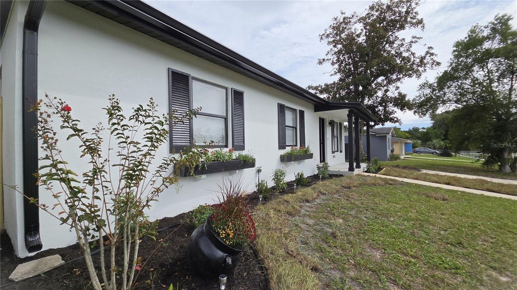 Photo of 1031 Cobblestone Avenue, Deltona, FL 32725 (MLS # V4951611)
