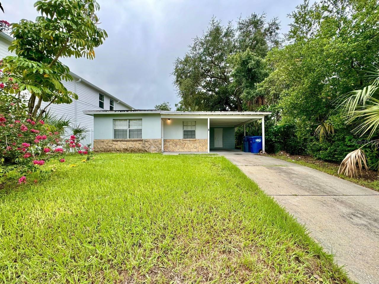 Charming 4-bedroom, 2-bathroom home with a carport in Old West Tampa. Featuring wood-look laminate flooring throughout and an open floorplan, this home offers a spacious living area perfect for entertaining. The galley-style kitchen includes a mix of stainless steel and black appliances, granite countertops, and plenty of cabinet space. A detached laundry room with washer/dryer hookups adds extra convenience. Ceiling fans throughout the home provide additional comfort. Located near the University of Tampa, Armature Works, and Downtown Tampa, this home offers easy access to some of the best dining and entertainment in the area. In addition to the advertised base rent, all residents are enrolled in the Resident Benefits Package (RBP) for $50.00/month which includes HVAC air filter delivery, credit building to help boost your credit score with timely rent payments, utility concierge service making utility connection a breeze during your move-in, and much more! More details upon application. Pets allowed on a case by case standard, with owner prior approval. Pet fee: $350 per pet at move in, and $35/mo per pet. Two pets max. Occupied and Available 10/24/2025