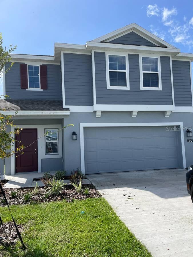 Photo of 1642 Teagan Lane, Winter Haven, FL 33884 (MLS # O6420842)