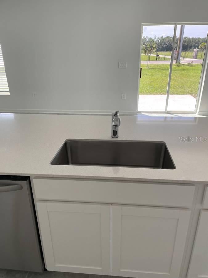 Photo of 1642 Teagan Lane, Winter Haven, FL 33884 (MLS # O6420842)