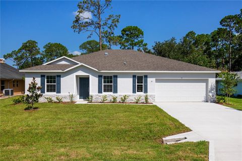 Photo of 61 Bruce Lane, Palm Coast, FL 32137 (MLS # O6317980)