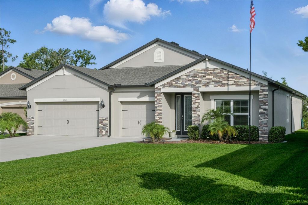 Photo of 12593 Retreat Place, Spring Hill, FL 34610 (MLS # TB8393089)