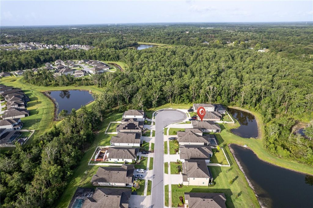 Photo of 12593 Retreat Place, Spring Hill, FL 34610 (MLS # TB8393089)