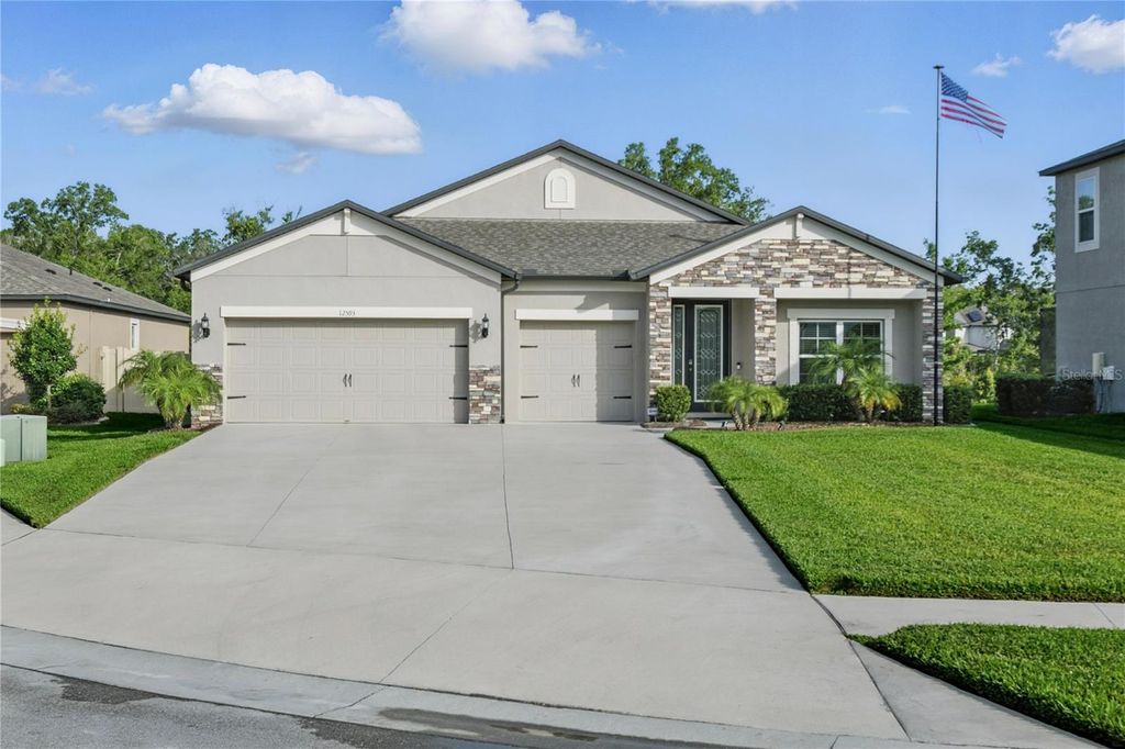 Photo of 12593 Retreat Place, Spring Hill, FL 34610 (MLS # TB8393089)