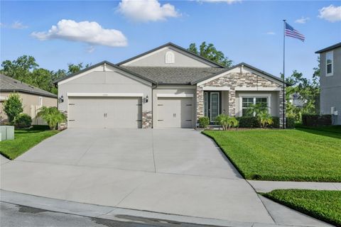 Photo of 12593 Retreat Place, Spring Hill, FL 34610 (MLS # TB8393089)