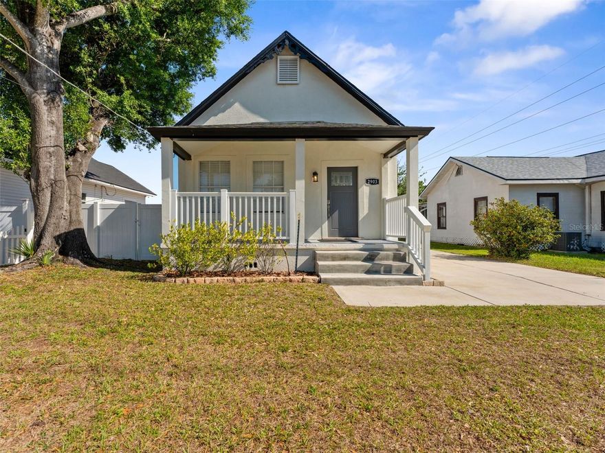 Charming and fully updated, this Tampa bungalow offers the perfect blend of character, comfort, and versatility—all in a prime central location. From the moment you step inside through the elegant glass front door, you’re welcomed into a bright, open-concept living space filled with natural light and designed for modern living.

The beautifully remodeled kitchen serves as the heart of the home, featuring sleek quartz countertops, stainless steel appliances, and a stylish hood vent, all seamlessly flowing into the main living area. The home offers three well-appointed bedrooms and one updated bathroom, each bedroom complete with ceiling fans, spacious closets, and ample storage. Tucked privately at the rear, the primary bedroom opens to the back deck through French doors, creating a peaceful retreat. It also includes convenient washer and dryer hookups within the closet. The bathroom has been thoughtfully updated with additional storage for everyday functionality.

Step outside to enjoy the newly enhanced outdoor living spaces, including front and back pavered areas perfect for entertaining or relaxing. The front porch has been completely redone, adding to the home’s already inviting curb appeal while maintaining its original charm—highlighted by the preserved decorative awning at the roof peak.

A major bonus is the ADU, now a fully renovated in-law suite complete with its own bathroom and kitchenette—ideal for guests, extended family, or income-producing potential. The spacious backyard offers plenty of room to create your own private oasis.

Recent upgrades provide peace of mind, including a new roof (2021), A/C system (2021), updated outdoor pavers (2021), brand-new flooring throughout (2025), a rebuilt front porch (2025), and an updated roof over the back porch (2025).

With its thoughtful upgrades, flexible living options, and unbeatable location in the heart of Tampa, this move-in-ready home is an exceptional opportunity for both homeowners and investors.
