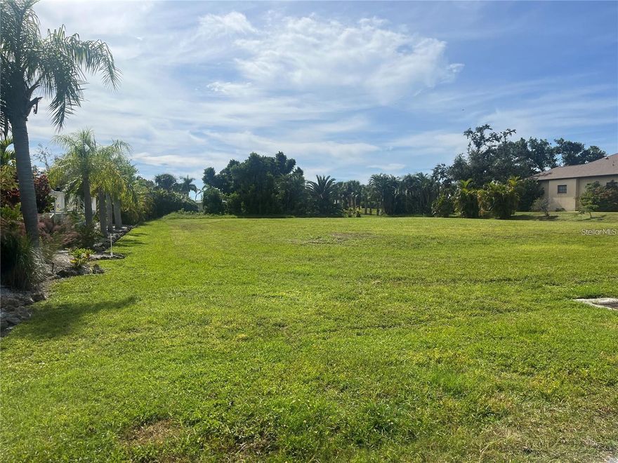 Exceptional oversized half-acre residential lot in an ideal location! Discover an incredible opportunity to build your dream home on this fully cleared and filled lot in Cape Haze West on the ICW side. Measuring 126’ of street frontage and 204’ deep, this generous home site sits on a quiet street framed by majestic banyan and ficus trees, creating a serene, tropical setting unique to this historic coastal community. Enjoy close proximity to the Intracoastal Waterway, three nearby marinas, Coral Creek Airport, a Tom Fazio Signature Golf Course, shopping, dining, and the pristine white sand beaches of Boca Grande, Palm Island, Little Gasparilla Island, and Don Pedro State Park. Established in the 1950s, Cape Haze is known for its timeless charm and ability to design your perfect place, bringing your vision to life.